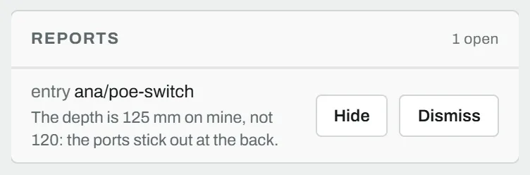The Reports card in an admin's work panel: an open report on an entry, with its reason, who sent it, a link to the entry, and Hide and Dismiss buttons